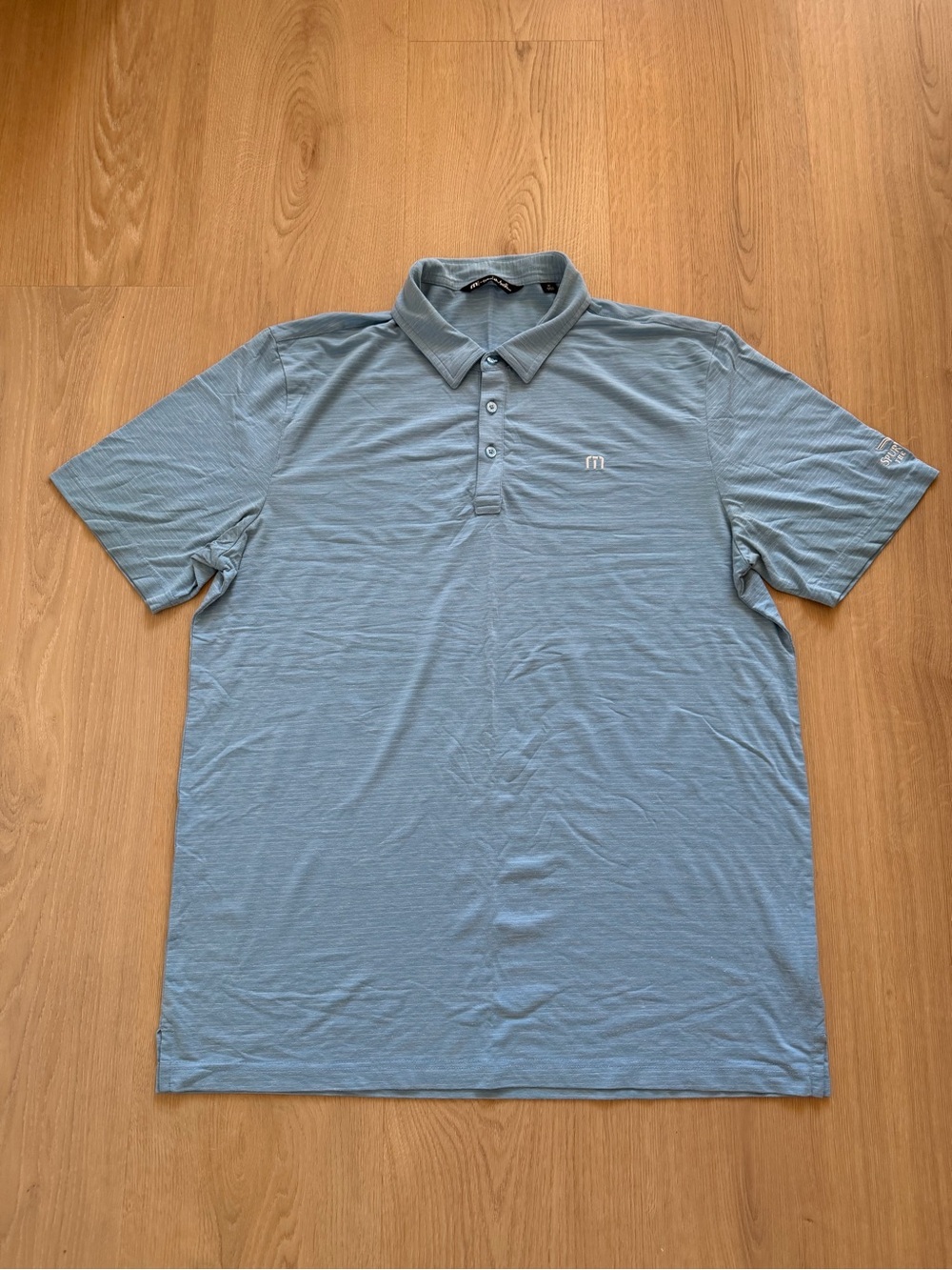 Travis Matthew Men's Light Blue Performance Polo Shirt